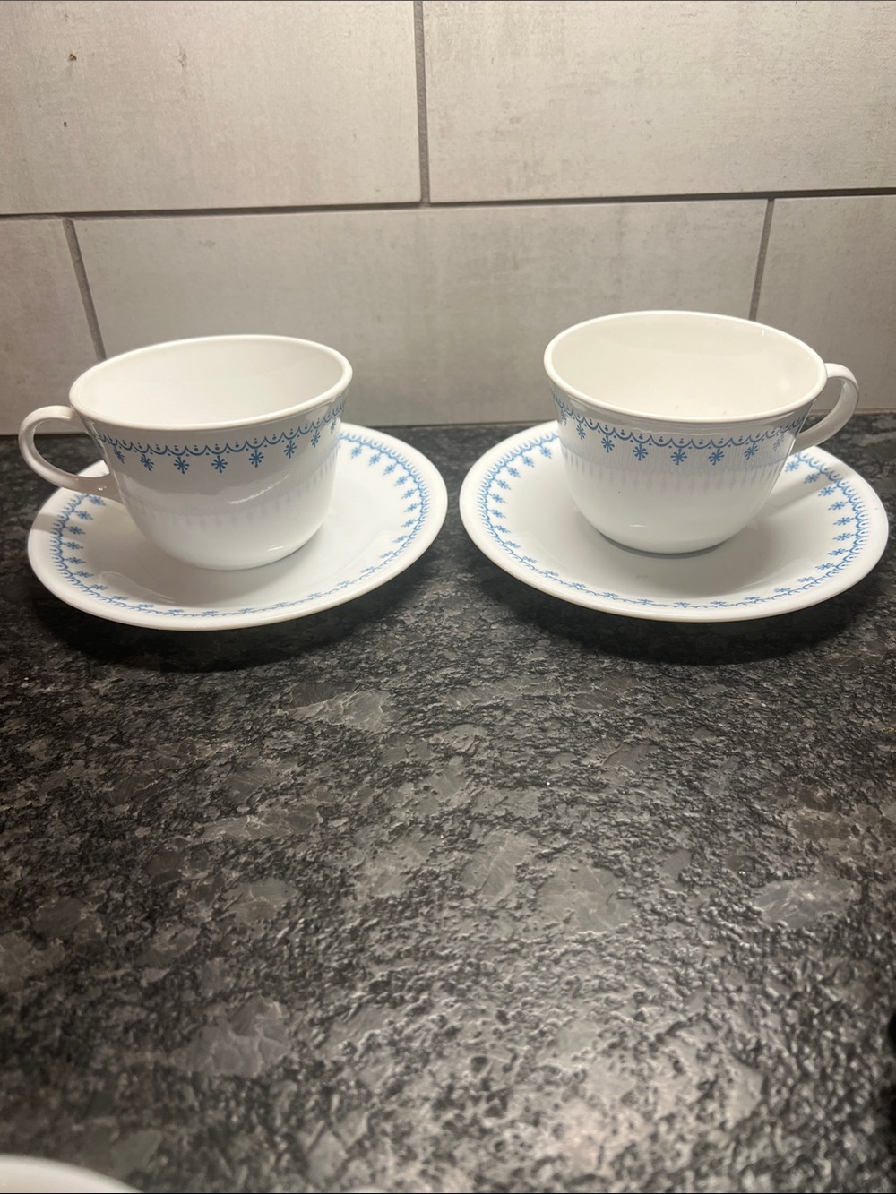 SNOWFLAKE BLUE BY CORELLE. CUP AND SAUCER SET. Blue and White. Exc condition